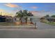 Charming single-story home with a well-manicured lawn and a driveway leading to an attached garage at 6442 Sutherland Ave, New Port Richey, FL 34653