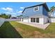 Large backyard featuring a concrete patio at 6841 Mitchell Cir, Tampa, FL 33634