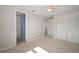 Bedroom with neutral walls, carpet and closets at 6841 Mitchell Cir, Tampa, FL 33634