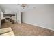 Open concept kitchen with tile flooring, a breakfast bar, and modern appliances at 6841 Mitchell Cir, Tampa, FL 33634