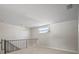 Spacious loft area features a large window for ample natural light at 6841 Mitchell Cir, Tampa, FL 33634