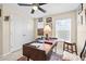 Well-lit home office with desk space, natural light, and closet at 6934 Duffy Ln, Tampa, FL 33616