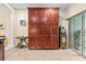 Spacious pantry featuring ample storage cabinets and tile flooring for organized kitchen supplies at 6934 Duffy Ln, Tampa, FL 33616