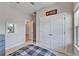 Bedroom with a large closet space and a view into the hallway to the rest of the house at 7116 Estero Ct, Apollo Beach, FL 33572