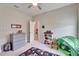 Neutral bedroom with carpet, ceiling fan, and closet storage space at 7116 Estero Ct, Apollo Beach, FL 33572
