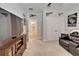 Bonus room with a large television, comfortable seating, and carpet flooring at 7116 Estero Ct, Apollo Beach, FL 33572