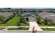 Charming single-Gathering home featuring a well-manicured lawn and landscaping with a two car garage at 7116 Estero Ct, Apollo Beach, FL 33572