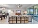 Inviting living room with a large TV and access to the screened in lanai at 7116 Estero Ct, Apollo Beach, FL 33572
