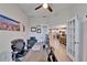 Home office showcasing French doors and a view into other rooms at 7116 Estero Ct, Apollo Beach, FL 33572