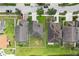 An overhead shot of homes and yards, providing a detailed view of property layouts, landscaping, and overall neighborhood design at 7509 Tangle Bend Dr, Gibsonton, FL 33534