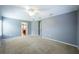 Spacious bedroom with neutral walls, carpet, and a bright, airy feel at 7509 Tangle Bend Dr, Gibsonton, FL 33534