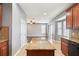 Kitchen island is spacious and overlooks the living area, great for entertaining at 7509 Tangle Bend Dr, Gibsonton, FL 33534