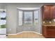 Sunny kitchen nook provides a cozy breakfast space with backyard views at 7509 Tangle Bend Dr, Gibsonton, FL 33534