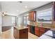 Kitchen has an island with seating and it opens to the living room at 7509 Tangle Bend Dr, Gibsonton, FL 33534