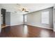 Bright open living room with dark wood flooring and natural light at 7509 Tangle Bend Dr, Gibsonton, FL 33534