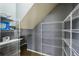 Under stairwell storage shelving at 7509 Tangle Bend Dr, Gibsonton, FL 33534