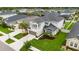 Two-story home with well-maintained landscaping, a two car garage and second story balcony at 8019 Marbella Creek Ave, Tampa, FL 33625