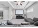 Upstairs loft featuring movie screen, cozy seating, recessed lighting, and lots of space at 8019 Marbella Creek Ave, Tampa, FL 33625