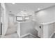 Spacious loft area with cozy carpet and a movie screen for entertainment at 8019 Marbella Creek Ave, Tampa, FL 33625