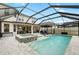 Outdoor swimming pool and integrated hot tub on a paved patio, with outdoor seating and dining at 8019 Marbella Creek Ave, Tampa, FL 33625