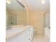 Bathroom with double sinks and a separate shower at 921 Linn Harbor Ct, Tarpon Springs, FL 34689