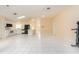 Spacious living room with tile flooring and an open floor plan at 921 Linn Harbor Ct, Tarpon Springs, FL 34689