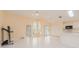 Bright living room with tile flooring and sliding glass doors at 921 Linn Harbor Ct, Tarpon Springs, FL 34689
