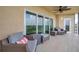 This unit boasts a large, shaded balcony with golf course views and comfortable outdoor seating at 960 Starkey Rd # 7503, Largo, FL 33771