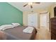 Inviting bedroom featuring bed, ceiling fan, closet, and easy access to the hallway, a private retreat at 960 Starkey Rd # 7503, Largo, FL 33771