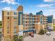 Exterior shot of a condominium building, showing architecture and parking at 960 Starkey Rd # 7503, Largo, FL 33771