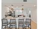 Modern kitchen with large island, quartz countertops, and pendant lighting at 960 Starkey Rd # 7503, Largo, FL 33771