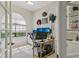 A cozy office space with bright natural lighting and built in shelving at 10113 Bell Creek Dr, Riverview, FL 33569