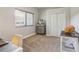 Functional office space includes ample lighting, a large window, and a closet for organized storage and productivity at 10113 Bell Creek Dr, Riverview, FL 33569