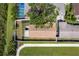 Aerial view of a fenced backyard, patio, and landscaping, showcasing the property's outdoor space and boundaries at 10202 Bellhurst Ct, Tampa, FL 33615