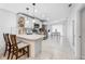 Bright, modern kitchen with white cabinetry, stainless steel appliances, and open layout perfect for cooking at 10202 Bellhurst Ct, Tampa, FL 33615