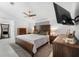 Elegant bedroom with wooden furniture, soft lighting, and a calming ambiance at 10202 Bellhurst Ct, Tampa, FL 33615