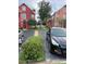 Charming townhome featuring colorful exterior, neat landscaping, and convenient parking at 10436 White Lake Ct # 10436, Tampa, FL 33626