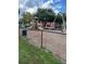 Community playground offering swings and a slide for outdoor fun and recreation at 10436 White Lake Ct # 10436, Tampa, FL 33626