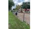 Community playground with a slide and climbing area, fully fenced for added security at 10436 White Lake Ct # 10436, Tampa, FL 33626