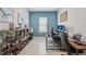 Comfortable office space with ample shelving, a large window, and a well-lit workstation for optimal productivity at 10580 Gliding Eagle Way, Land O Lakes, FL 34638