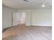 Spacious bedroom featuring neutral carpet, a ceiling fan, and an open doorway to the rest of the house at 10605 Marsanne Pl, Riverview, FL 33578