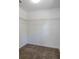 Walk-in closet with neutral carpet and wire rack shelving throughout at 10605 Marsanne Pl, Riverview, FL 33578