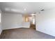 Upstairs hallway featuring neutral carpet, white walls, and recessed lighting at 10605 Marsanne Pl, Riverview, FL 33578