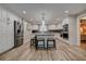 Spacious kitchen with island, stainless appliances and white cabinetry at 1117 S Florida Ave, Tarpon Springs, FL 34689