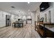Bright kitchen with wood tile floors, white cabinets and stainless steel appliances at 1117 S Florida Ave, Tarpon Springs, FL 34689