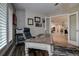 Home office featuring wood look floors and a view of the kitchen and living spaces at 1117 S Florida Ave, Tarpon Springs, FL 34689