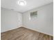 Bright bedroom with wood flooring and a built-in closet at 1135 17Th Sw Ave, Largo, FL 33778
