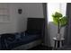Cozy bedroom with modern decor and natural light at 12794 Palm Dr, Largo, FL 33774