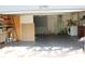 Spacious garage interior with ample storage, laundry area, and convenient access to the home at 12794 Palm Dr, Largo, FL 33774