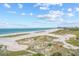 Expansive beach view with clear blue skies and a scenic coastline at 1290 Gulf Blvd # 702, Clearwater Beach, FL 33767